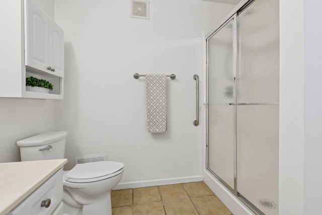 913 Carriage Ln, Chaska, MN 55318 - full bath with a shower stall, vanity, and tile patterned flooring