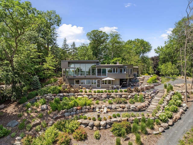 5962 Hobe Ln, White Bear Twp, MN 55110 - back of property with a patio area and a wooden deck