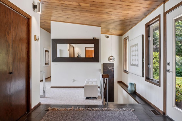 5962 Hobe Ln, White Bear Twp, MN 55110 - foyer entrance featuring wooden ceiling and vaulted ceiling