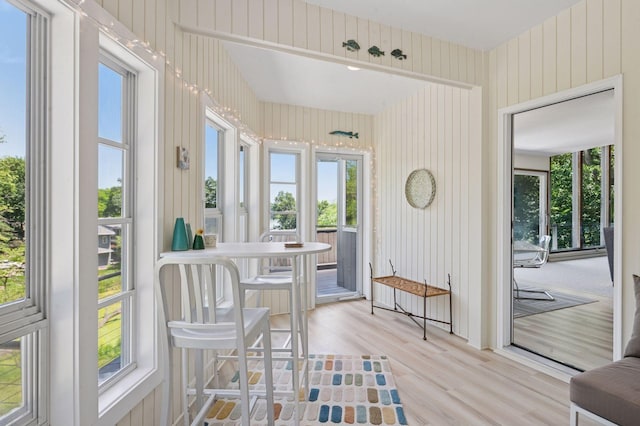 5962 Hobe Ln, White Bear Twp, MN 55110 - sunroom / solarium featuring wood finished floors and healthy amount of natural light