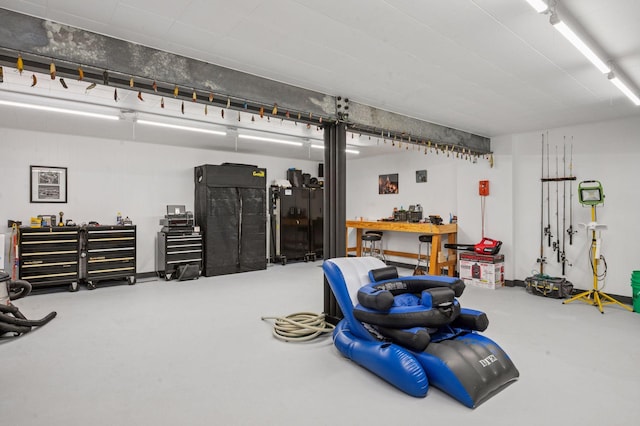 5962 Hobe Ln, White Bear Twp, MN 55110 - garage featuring a workshop area
