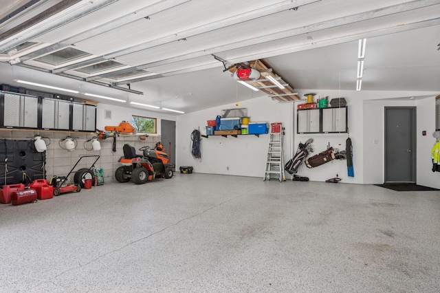 5962 Hobe Ln, White Bear Twp, MN 55110 - garage with a garage door opener