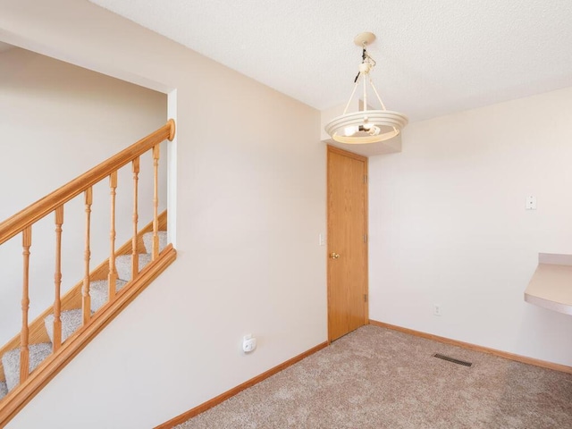 2248 Affirmed Dr, Shakopee, MN 55379 - empty room with carpet and stairway