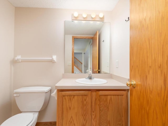 2248 Affirmed Dr, Shakopee, MN 55379 - half bathroom featuring toilet and vanity