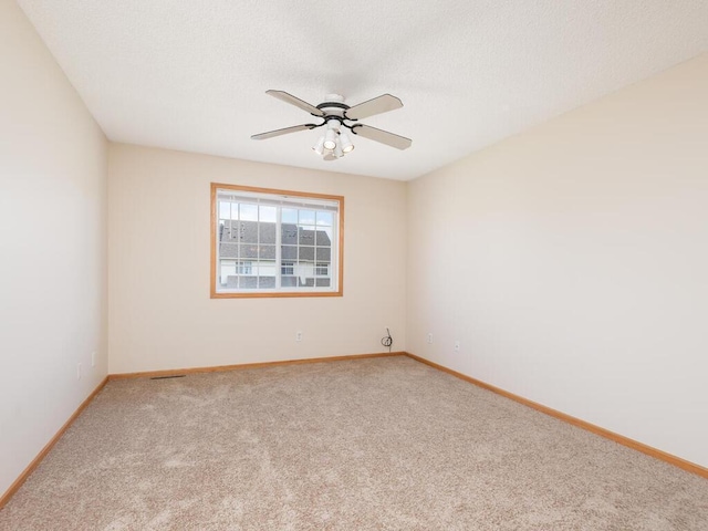 2248 Affirmed Dr, Shakopee, MN 55379 - carpeted empty room featuring ceiling fan and a textured ceiling