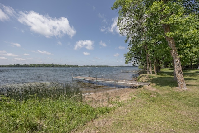 551 Edward Ln NE, Longville, MN 56655 - dock area featuring a water view and a lawn
