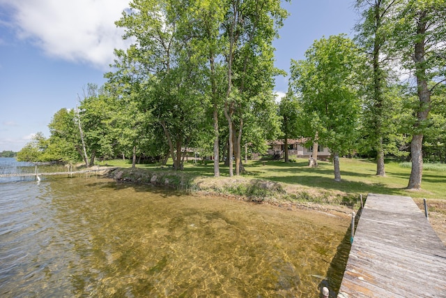 551 Edward Ln NE, Longville, MN 56655 - dock featuring a water view and a lawn