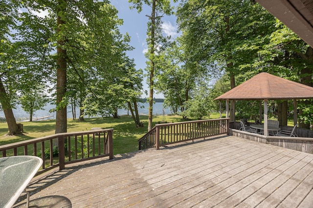 551 Edward Ln NE, Longville, MN 56655 - deck featuring a gazebo, a water view, and a lawn