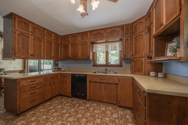 551 Edward Ln NE, Longville, MN 56655 - kitchen featuring dishwasher, brown cabinets, a peninsula, and light countertops