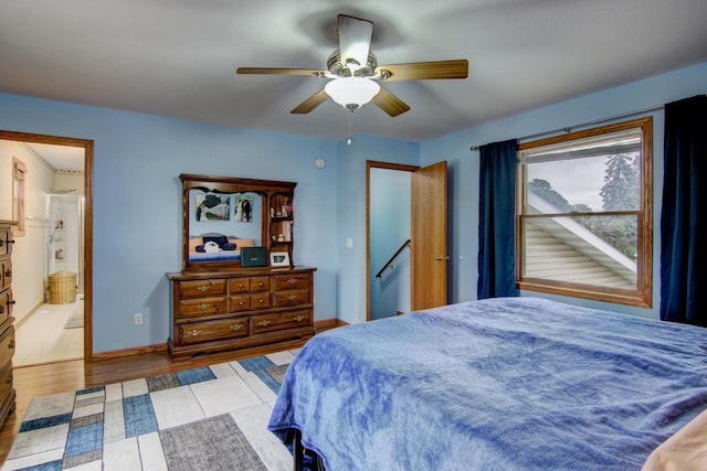 427 Alleghany Ave, Wabasha, MN 55981 - bedroom with ceiling fan, wood finished floors, and ensuite bathroom