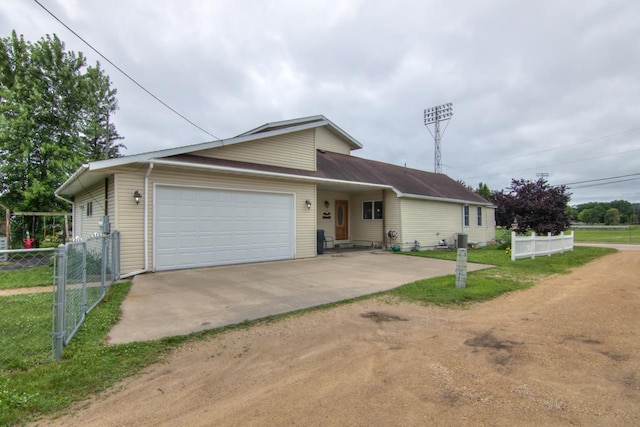427 Alleghany Ave, Wabasha, MN 55981 - view of front facade with driveway and an attached garage