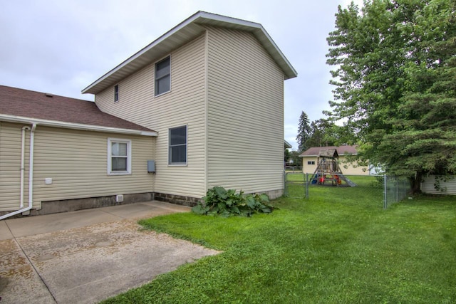 427 Alleghany Ave, Wabasha, MN 55981 - back of property featuring a playground and a patio area