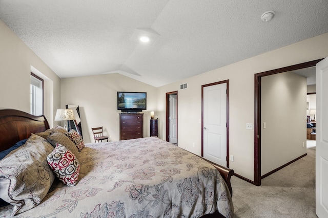 5062 French Dr N, Hugo, MN 55038 - bedroom with light colored carpet, vaulted ceiling, and a textured ceiling