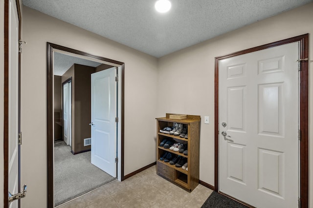 5062 French Dr N, Hugo, MN 55038 - hallway with a textured ceiling