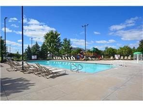 5062 French Dr N, Hugo, MN 55038 - community pool featuring a patio area