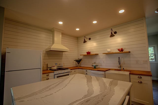 850 60th Ave SW, Benson, MN 56231 - kitchen featuring white appliances, custom range hood, white cabinets, and recessed lighting