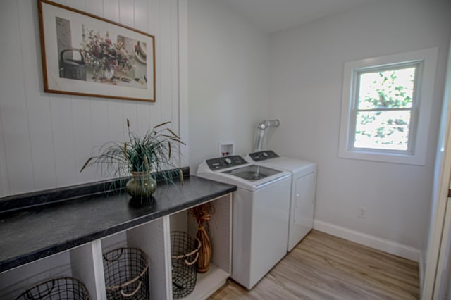 850 60th Ave SW, Benson, MN 56231 - washroom with washer and dryer and light wood-style flooring