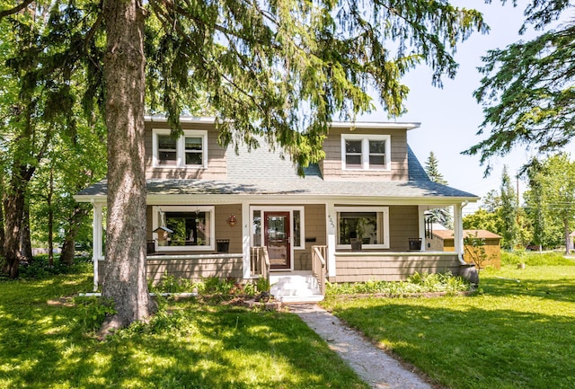4223 Mcculloch St, Duluth, MN 55804 - view of front of house featuring a porch, a front lawn, and roof with shingles