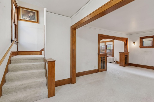 2085 Princeton Ave, Saint Paul, MN 55105 - stairway featuring radiator, carpet flooring, and ornamental molding