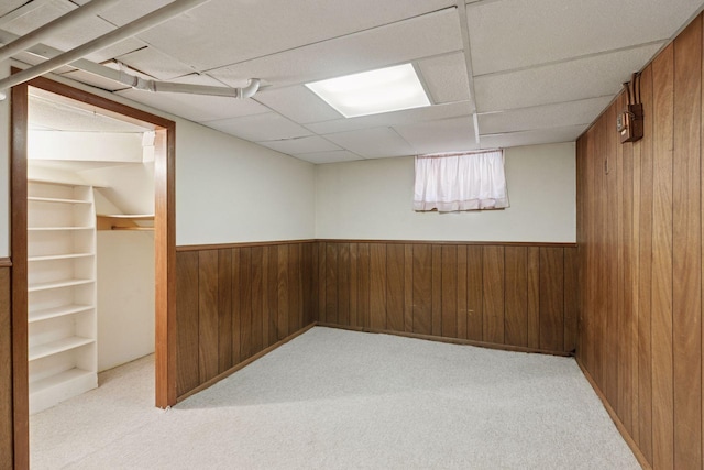 2085 Princeton Ave, Saint Paul, MN 55105 - basement with wood walls, carpet, a wainscoted wall, and a drop ceiling