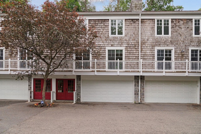 204 Central Ave S, Wayzata, MN 55391 - multi unit property featuring an attached garage and a chimney