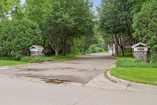 204 Central Ave S, Wayzata, MN 55391 - view of asphalt road with curbs