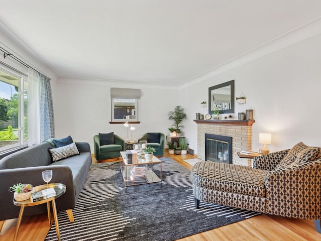 910 62nd St, Minneapolis, MN 55419 - living area featuring wood finished floors, a fireplace, and crown molding