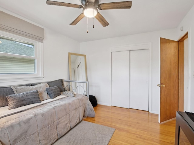 910 62nd St, Minneapolis, MN 55419 - bedroom with light wood finished floors, a closet, and a ceiling fan