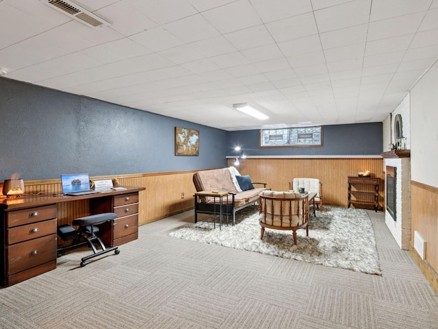 910 62nd St, Minneapolis, MN 55419 - home office featuring a wainscoted wall, wood walls, carpet floors, and a fireplace