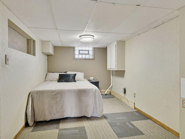 910 62nd St, Minneapolis, MN 55419 - bedroom featuring a paneled ceiling, carpet flooring, and a textured wall