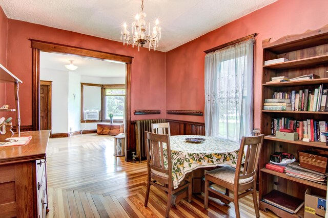924 6th St W, Wabasha, MN 55981 - dining space featuring a chandelier and cooling unit