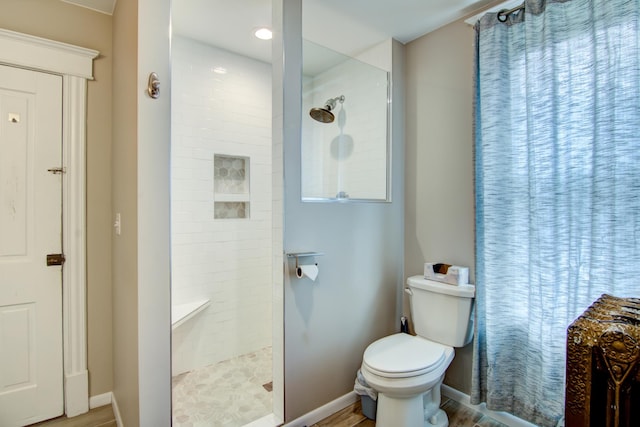 924 6th St W, Wabasha, MN 55981 - full bath featuring a tile shower, recessed lighting, and wood finished floors