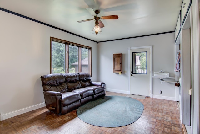 924 6th St W, Wabasha, MN 55981 - living area with healthy amount of natural light, ceiling fan, and ornamental molding
