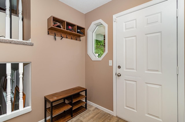 5750 Lone Oak Dr, Savage, MN 55378 - entryway with light wood-style flooring and baseboards