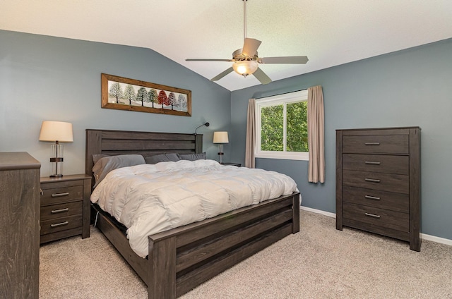 5750 Lone Oak Dr, Savage, MN 55378 - bedroom featuring light colored carpet, lofted ceiling, and a ceiling fan