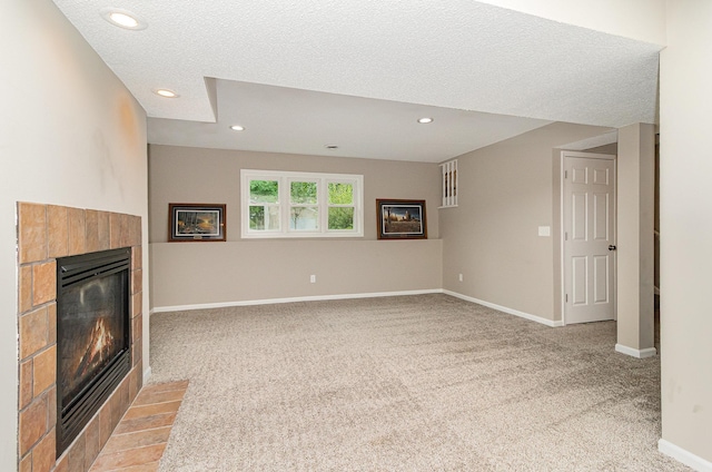 5750 Lone Oak Dr, Savage, MN 55378 - unfurnished living room with a fireplace, light carpet, a textured ceiling, and recessed lighting