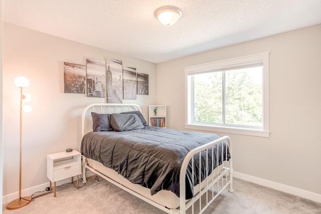 141 145th Ln NE, Ham Lake, MN 55304 - carpeted bedroom featuring baseboards