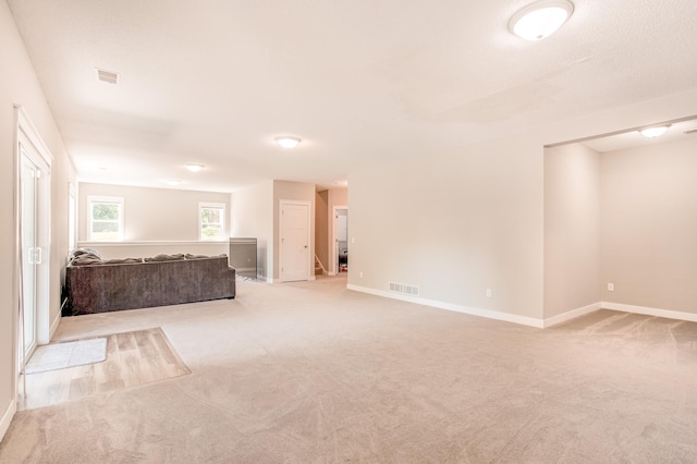 141 145th Ln NE, Ham Lake, MN 55304 - unfurnished bedroom featuring light carpet