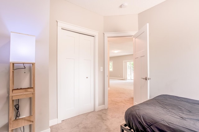 141 145th Ln NE, Ham Lake, MN 55304 - bedroom with light colored carpet and a closet