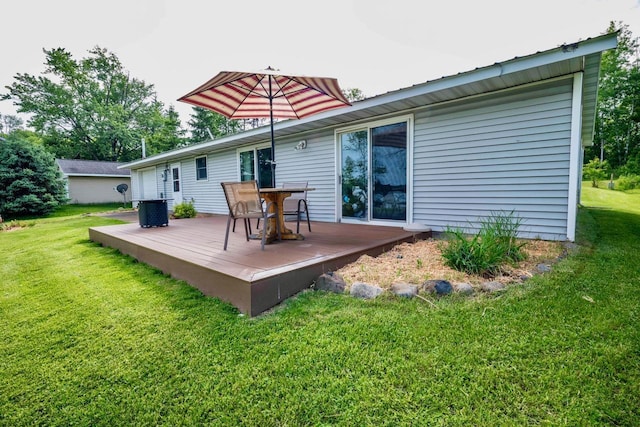63714 Hannu Ln, Pine Lake Twp, MN 55735 - rear view of property featuring a wooden deck and a lawn
