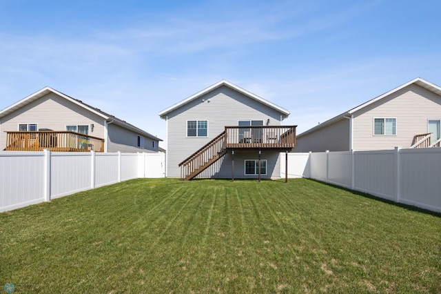 1009 Highland Ln W, West Fargo, ND 58078 - rear view of house featuring a deck, stairway, and a fenced backyard