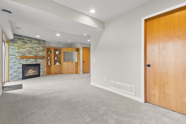 6913 174th St W, Farmington, MN 55024 - unfurnished living room with carpet, recessed lighting, and a fireplace