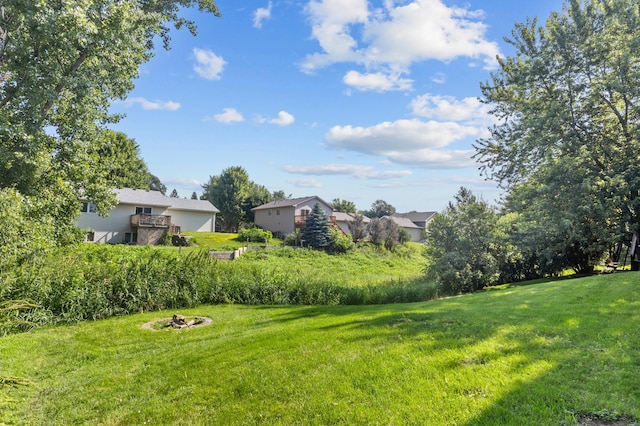 6913 174th St W, Farmington, MN 55024 - view of grassy yard featuring a fire pit