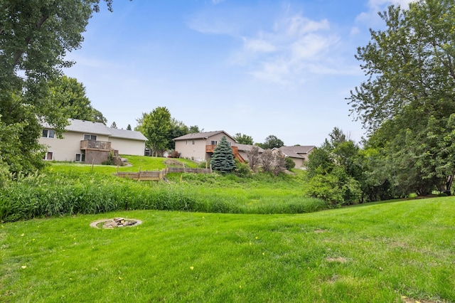 6913 174th St W, Farmington, MN 55024 - view of grassy yard featuring an outdoor fire pit