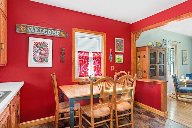4918 Glenwood St, Duluth, MN 55804 - dining area with baseboards and wood finished floors