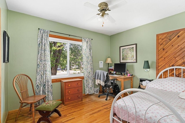 4918 Glenwood St, Duluth, MN 55804 - bedroom featuring an office area, light wood-style floors, and ceiling fan
