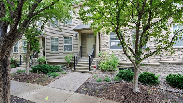 11333 Stratton Ave, Eden Prairie, MN 55344 - view of front facade featuring stone siding
