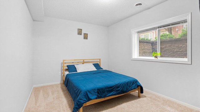 11333 Stratton Ave, Eden Prairie, MN 55344 - carpeted bedroom with baseboards and a textured ceiling