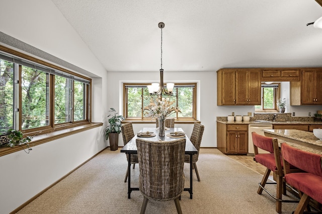 1306 Wynridge Dr, Arden Hills, MN 55112 - dining space with light colored carpet, a chandelier, and lofted ceiling