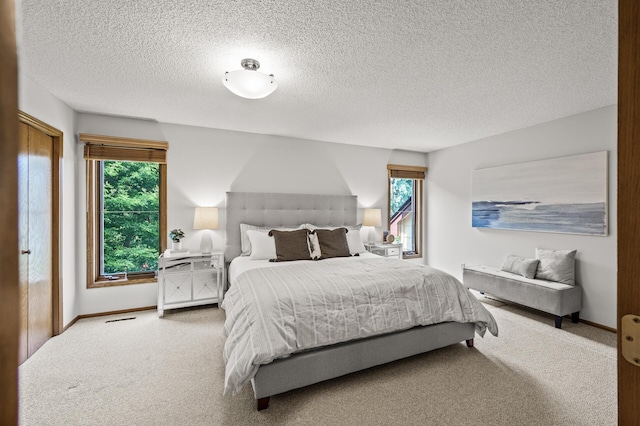1306 Wynridge Dr, Arden Hills, MN 55112 - carpeted bedroom with baseboards and a textured ceiling